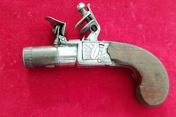 A good quality English Flintlock Box-lock pistol by PATRICK with folding trigger. C. 1800. Ref 2269.